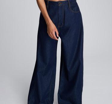 Pantalón amplio de cintura alta con pliegue lateral para mujer