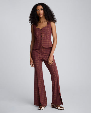 Chaleco peplum de corte curvo con cuatro botones para mujer