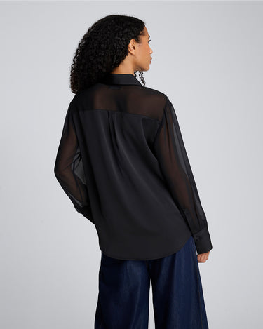 Camisa manga larga con canesú y mangas transparentes para mujer