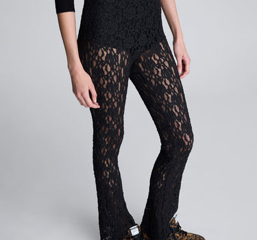 Pantalón acampanado con cintura elastica y short interno para mujer