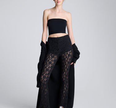 Pantalón acampanado con cintura elastica y short interno para mujer